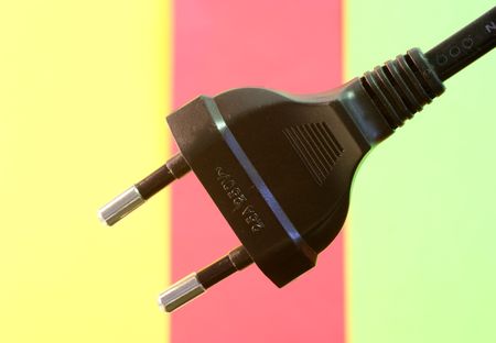 an  electricity fuse adapter in a simple green backgroundの写真素材