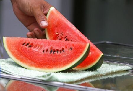 a watermelon in a table at Bangkok at Thailandの写真素材