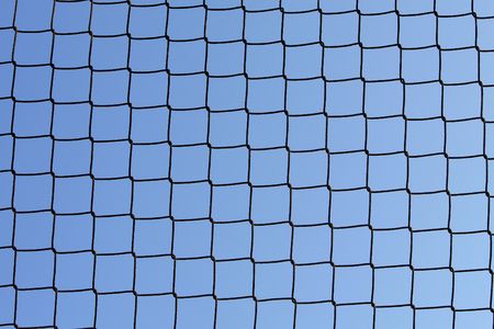 a  wire fence background taken in a fieldの写真素材