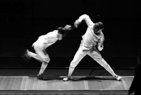 an action photography with two fencersの写真素材