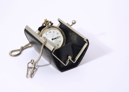 pocket watch into purseの写真素材