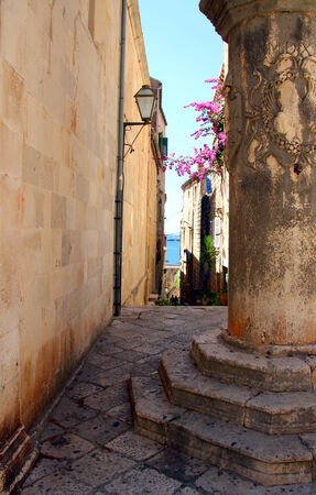 Street of Korcula. Old column in the alley. Croatiaの写真素材
