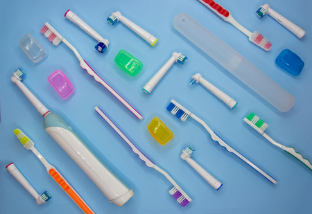 Top view of toothbrushes in colorful on pastel color background.の写真素材