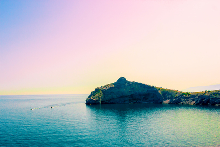 The view from the height of the mountain in the sea at sunset. Crimea landscapeの写真素材