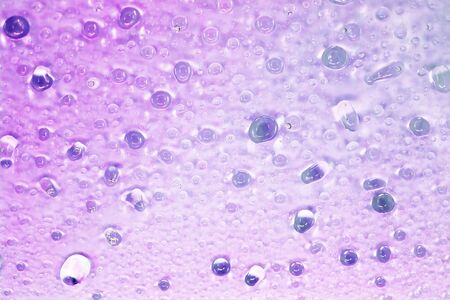 Beautiful violet pr purple drops of water fit for the background imageの写真素材