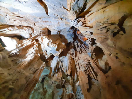 Ancient karst cave with stalactites and stalagmitesの写真素材