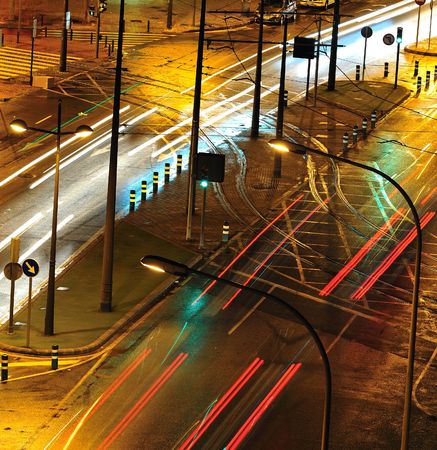 Street in the night, wetting and with lights of traffic