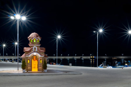 Coastal small church, the chapel on the pier, on the seashore, night view, Bulgariaの写真素材