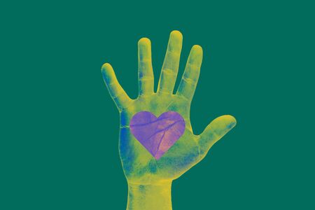 Green human hand without distinction of gender or race. There is only one race, the human race. All lives matter. Save the planet.の写真素材