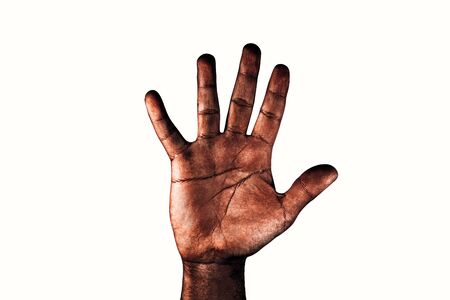 Open palm of a black man with spread fingers asking for stop racism isolated on white background.の写真素材