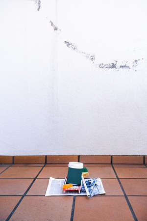 Tools for painting on the terrace of the house. Painting and reforming the corners of the house.の写真素材