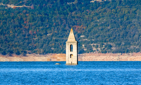Church of the Sau swamp. Sau Reservoir. Landscape of the Sau swamp in a sunny day. Tourism in Osona, Barcelona, Catalunya, Spain.の写真素材