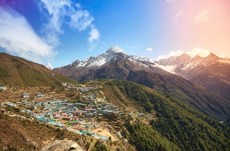 View of Namche bazar and mount Thamserku with sunshine - way to everest base camp, Khumbu valley, Sagarmatha national park, Solukhumbu, Nepalの写真素材