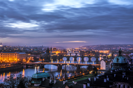 View of Prague from Letna park with bridges over Vltava river and Charles bridge in the morning. Prague. Czech Republic. Dramatic sky.の写真素材