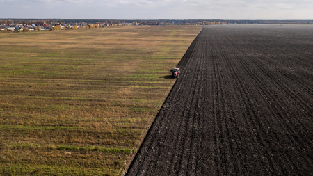 tractor plowing the field