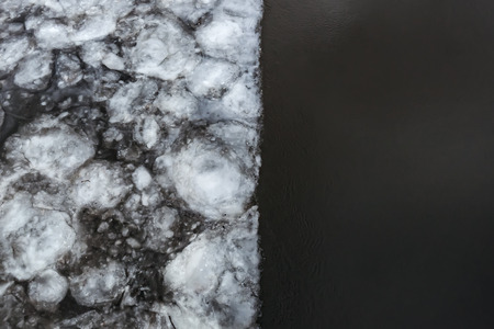 Flood in spring. Ice on half the river. Awakening of natureの写真素材