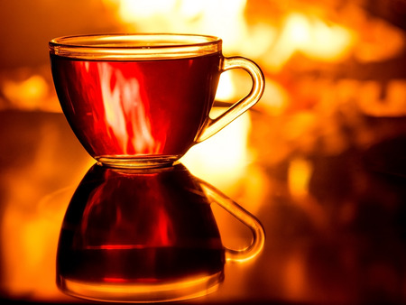 Cup of tea by the fireplace