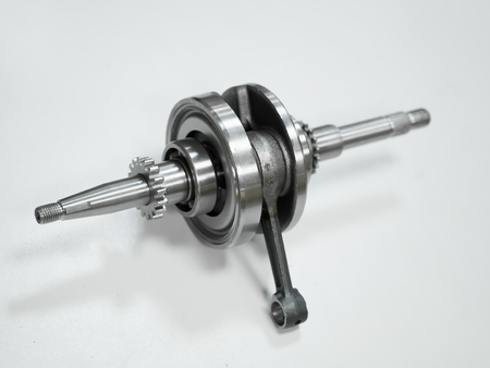crankshaft of a motorcycle on a white backgroundの写真素材