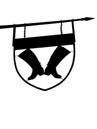 the sign of a shoemaker. Two of a kind hanging at the peakの写真素材