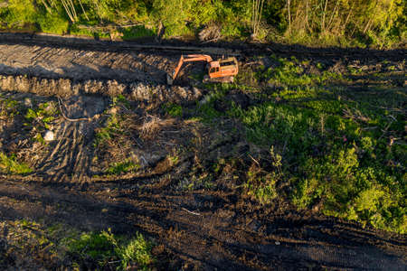 excavator dripping channel on the swamp top view