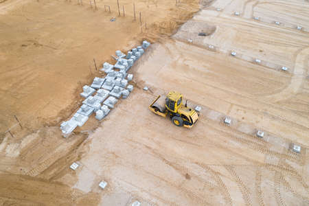 rammer working on a construction site top view