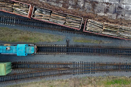 loading trucks with wooden products at the factory aerial view.の写真素材