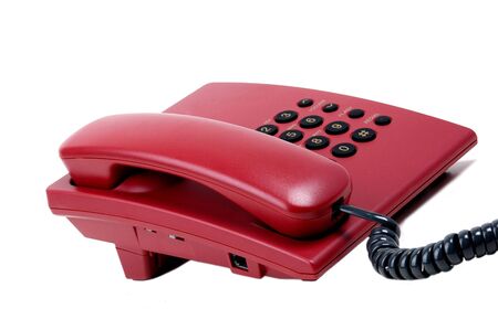 Red phone on a white background                                の写真素材