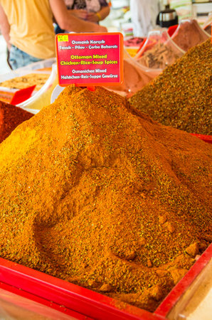 Pyramids of multi-colored spices on the Turkish marketの写真素材
