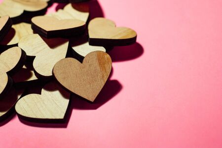 heart on a pink background, next to many other hearts, design of a greeting card, illustration, valentine's day, birthday, declaration of loveの写真素材