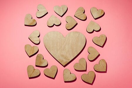 love, lots of hearts made of wood, design for a card, romantic backgroundの写真素材