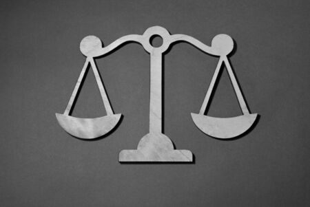 wooden scales on a gray background, isolate