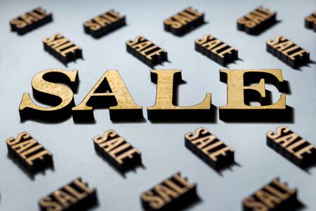 sale, design for sale, stylish golden wood letters on a gray background, autumn saleの写真素材