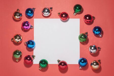 Christmas composition. Christmas toys on a red background. space for text, design greetings. bright designの写真素材