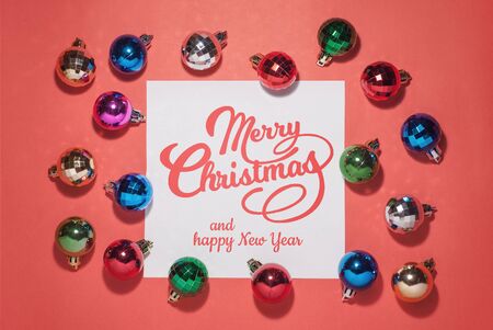 Christmas composition. Christmas toys on a red background. Congratulations on Christmas and New Year, design greetings. bright designの写真素材