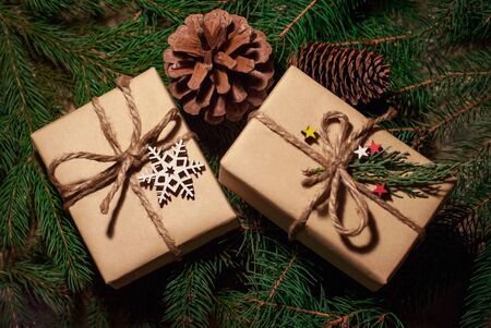 Christmas gifts and greetings with Christmas, Christmas tree background, top viewの写真素材