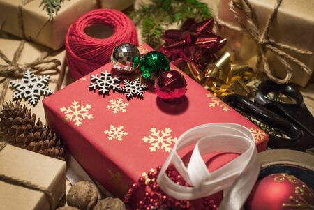 Christmas handmade with ribbon threads and pine cones, a Christmas present with your own handsの写真素材