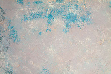 Concrete blue lavender background with scuffs and black splashes. Textured wall texture in the...