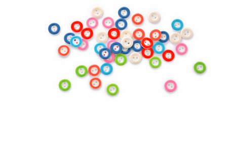Pile of colorful buttons on white background. use for tailoring and sew