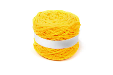 yellow baby plush yarn white background needlework handmade woolen textured macro with white lable...