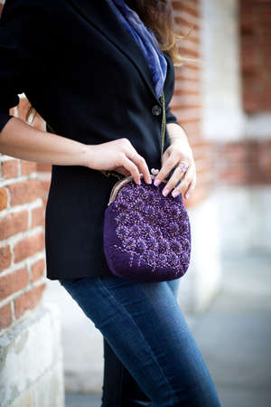 purple Elegant Felting wool fashion handmade handbag in hand. street fashion lookの写真素材
