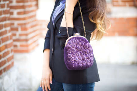 purple Elegant Felting wool fashion handmade handbag in hand. street fashion lookの写真素材