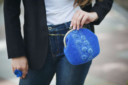blue Elegant Felting wool fashion handmade handbag in hand. street fashion lookの写真素材