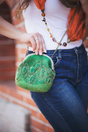 green Elegant Felting wool fashion handmade handbag in hand. street fashion lookの写真素材