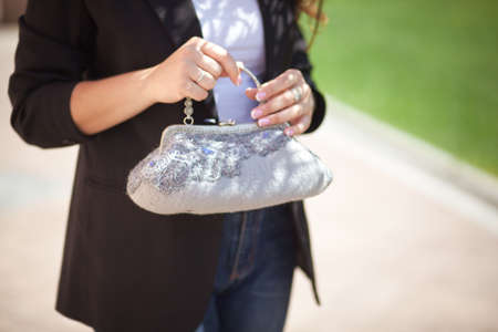 gray Elegant Felting wool fashion handmade handbag in hand. street fashion lookの写真素材