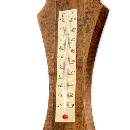 Old style thermometer on wood texture isolated on white background. room temperature.の写真素材