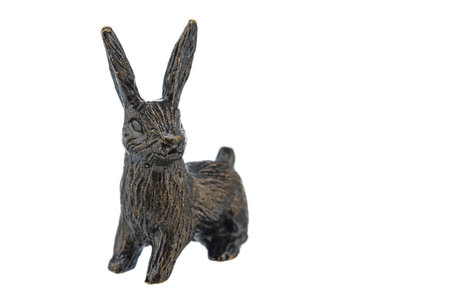 Lion Vintage Antique grunge bronze brass figurine statue of beautiful animal, isolated on white background. Decoration Sculpture for interior. Copy Space for Text. Close up Selective soft focus.の写真素材