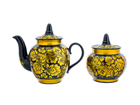 Tea Set of Old Black Gold Traditional Russian folk utensils. Dishes teapot and sugar bowl with handmade painting floral ornament in style isolated on white background.の写真素材