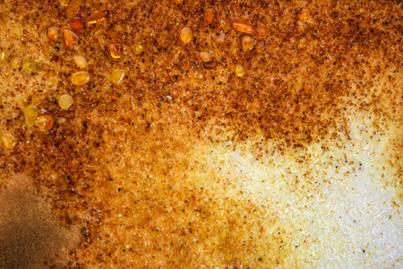 Multi colored granite Texture Mosaic of Natural gemstone Spilled amber in contour sunlight as...