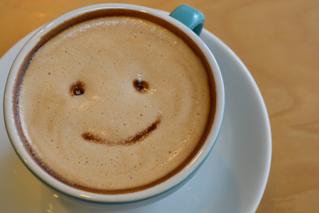 Cappuccino on wooden table brown colorの写真素材