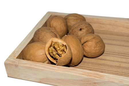 Walnuts on a wooden tray